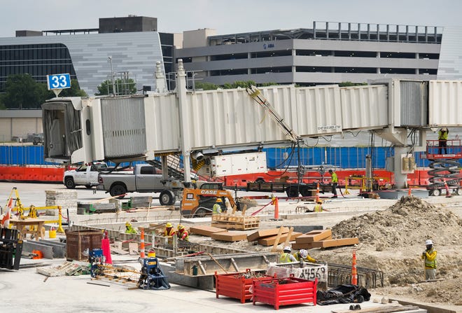 Work continues on the west gate terminal expansion at Austin-Bergstrom International Airport on Thursday. The expansion will add 84,500 square feet over three levels. Much more is in the works as the airport grows to accommodate increasing numbers of travelers.